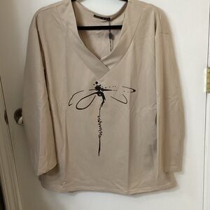 C.O.Z.Y Beige V-Neck Blouse with Artistic Design